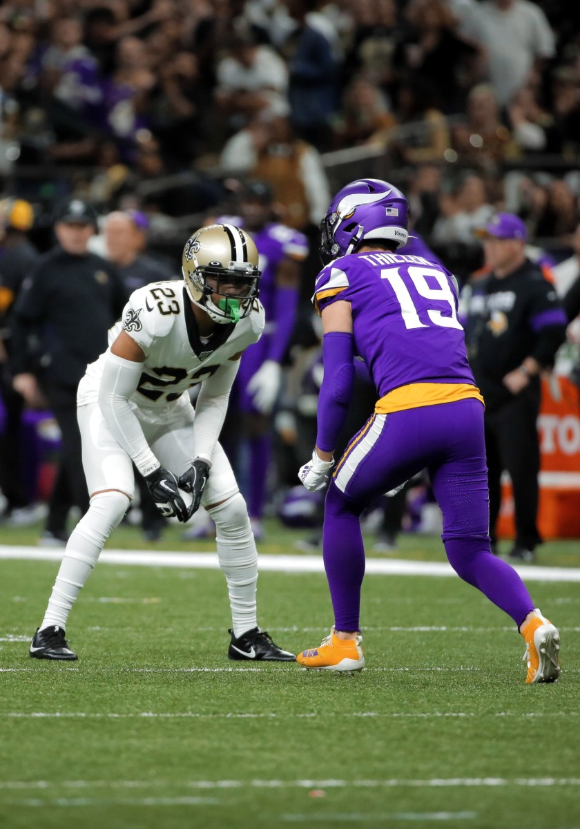 New Orleans Saints cornerback Marshon Lattimore (23) defends Minnesota Vikings receiver Adam Thielen (19) during a NFC Wild Card playoff game. Mandatory Credit: Derick Hingle-USA TODAY Sports